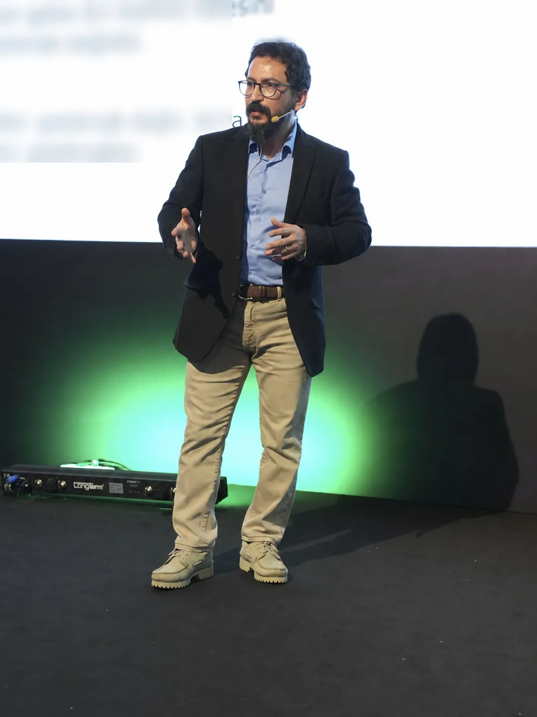 Osman Daggezen speaking at a pharma national meeting